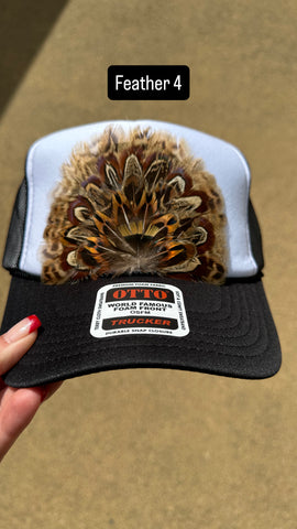 BLACK AND WHITE FEATHER TRUCKER HAT