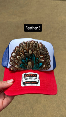 RED WHITE AND BLUE FEATHER TRUCKER HAT