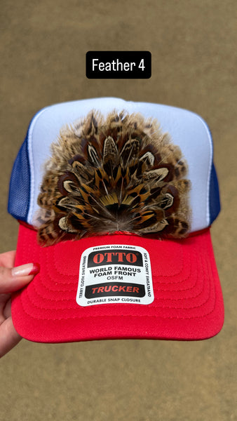 RED WHITE AND BLUE FEATHER TRUCKER HAT