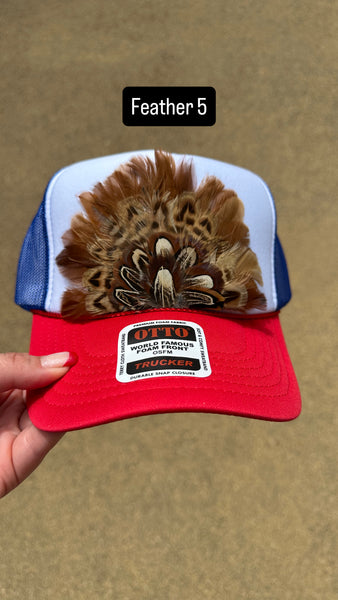 RED WHITE AND BLUE FEATHER TRUCKER HAT